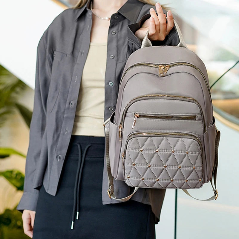 Neutral color backpack for men and women, suitable for students' spring outings and schoolbags with zippers