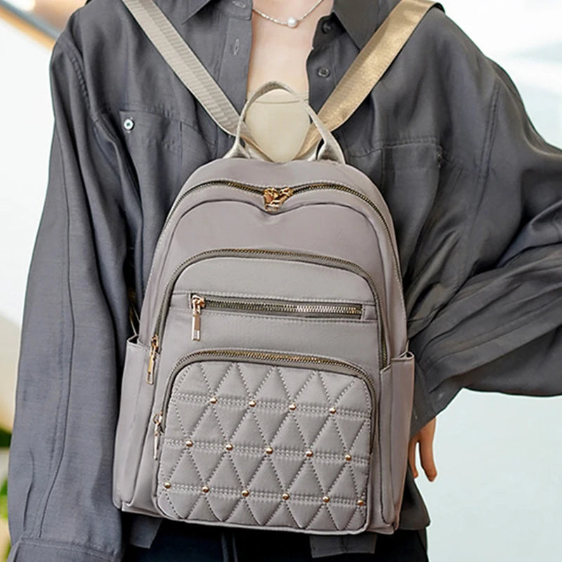 Neutral color backpack for men and women, suitable for students' spring outings and schoolbags with zippers